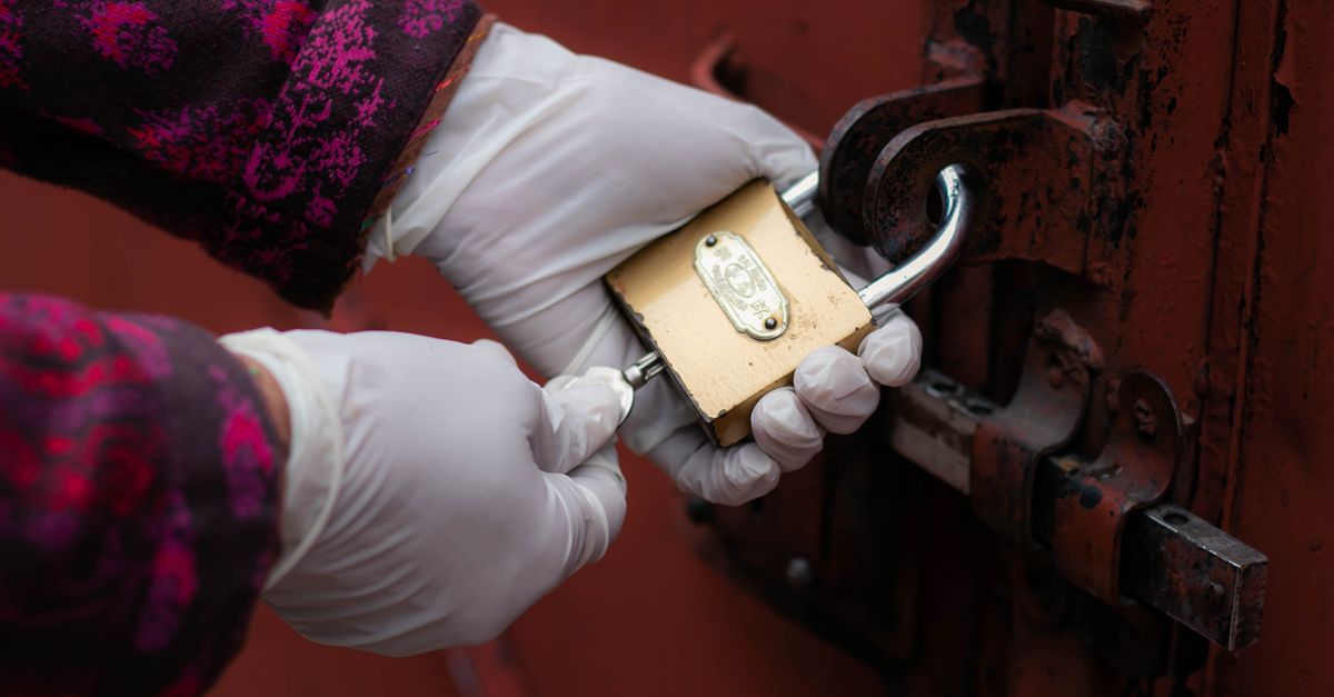 locksmith unlocking front door — Bayside Locksmith Queens